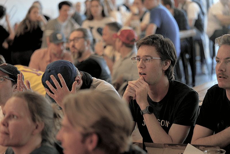 The thrill of possible victory and the agony of defeat were expressed by Garet Grant and Elijah Heggerness as they watched the Timberwolves play the Dallas Mavericks in Game 3 of the Western Conference Finals on TV at HeadFlyer Brewery, which was packed with fans. (Davis Steen)